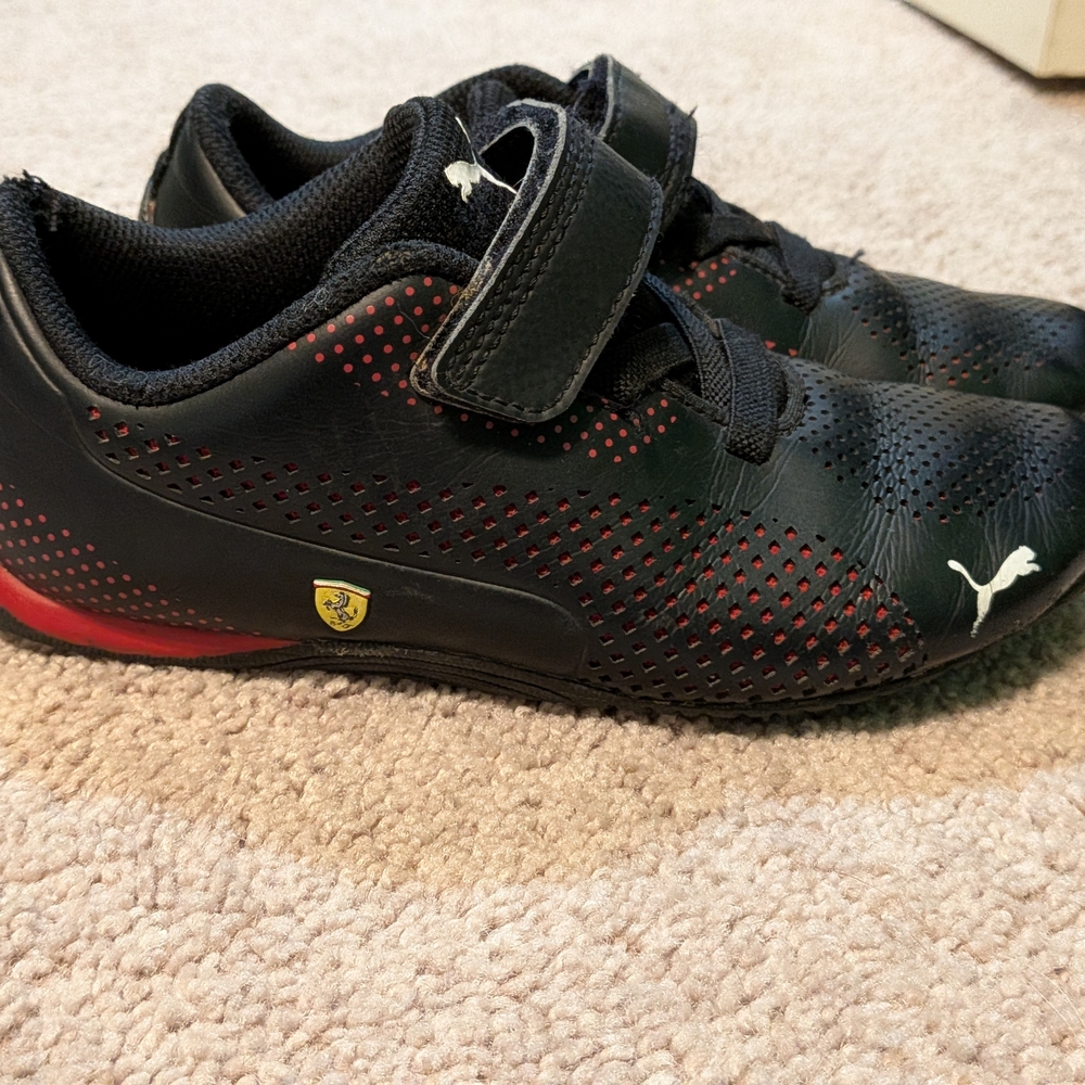Puma Kids Black Sneakers with Red Accents